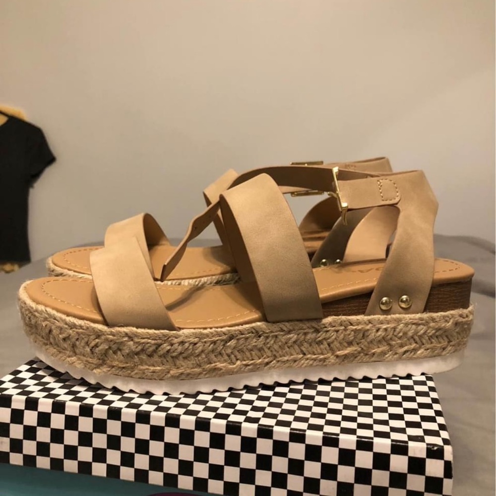 Tan colored platform sandals
